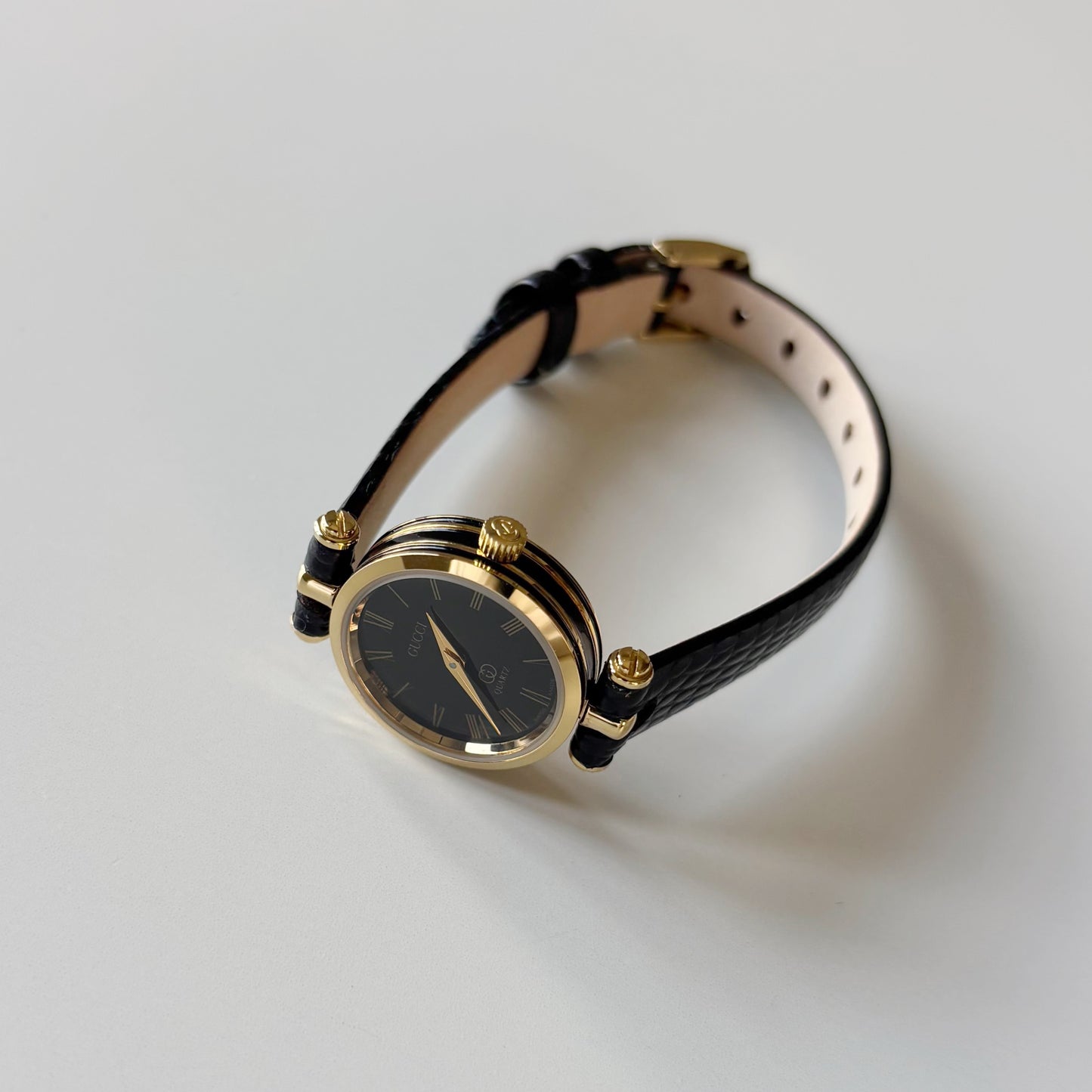 Gucci 1980s Black Round Dial Gold Plated Watch