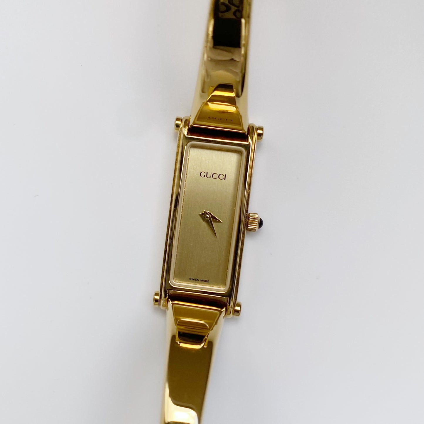 Gucci 1990s Rectangular Gold Dial Gold Plated Bangle Watch (Small)