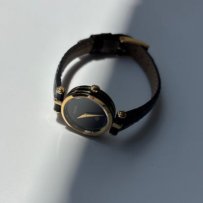 Gucci 1980s Black Dial Round Gold-Plated Watch