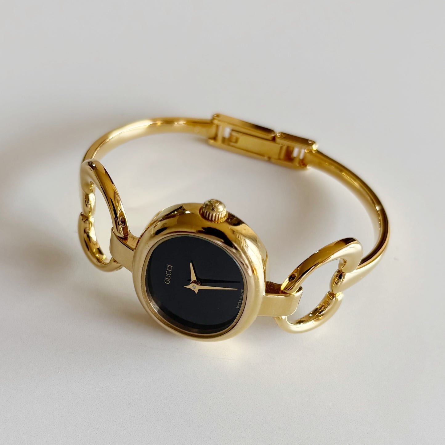 Gucci 1990s Oval Black Dial Gold Plated Bangle Watch (Small)
