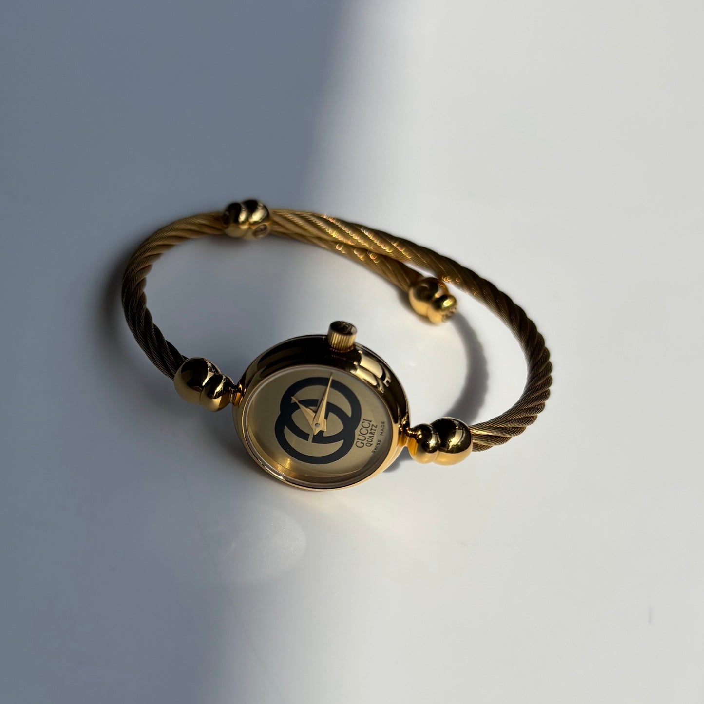 Gucci 1980s Round Dial Cable Band Bangle Watch