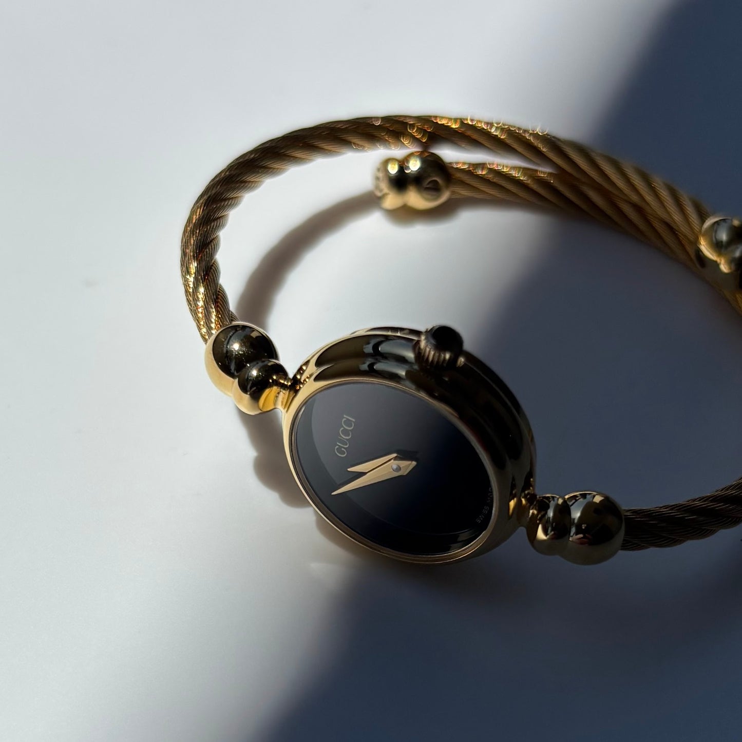 Gucci 1990s Black Dial Gold Plated Cable Bangle Watch