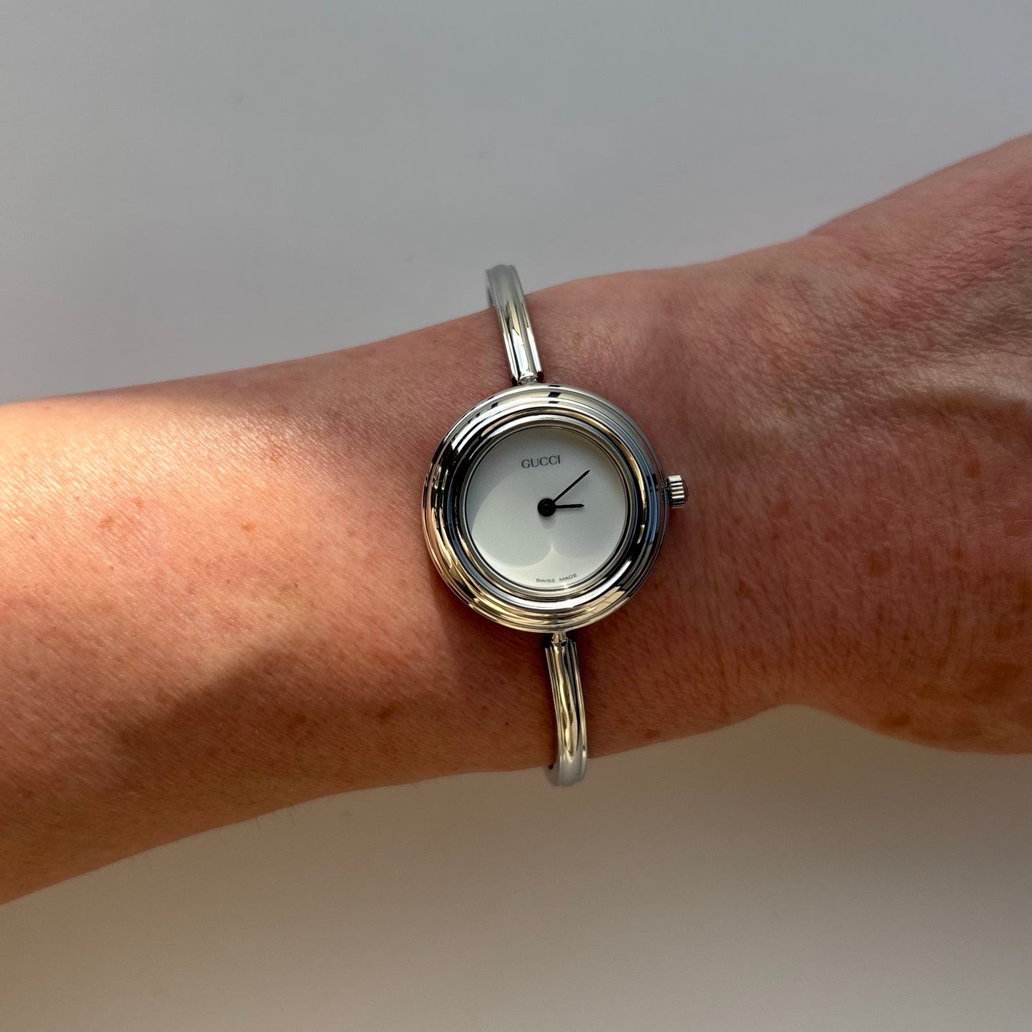 Gucci 1990s Interchangeable Bezel Stainless steel Bangle Watch with 12 bezels, case (Small)