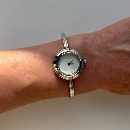 Gucci 1990s Interchangeable Bezel Stainless steel Bangle Watch with 12 bezels, case (Small)