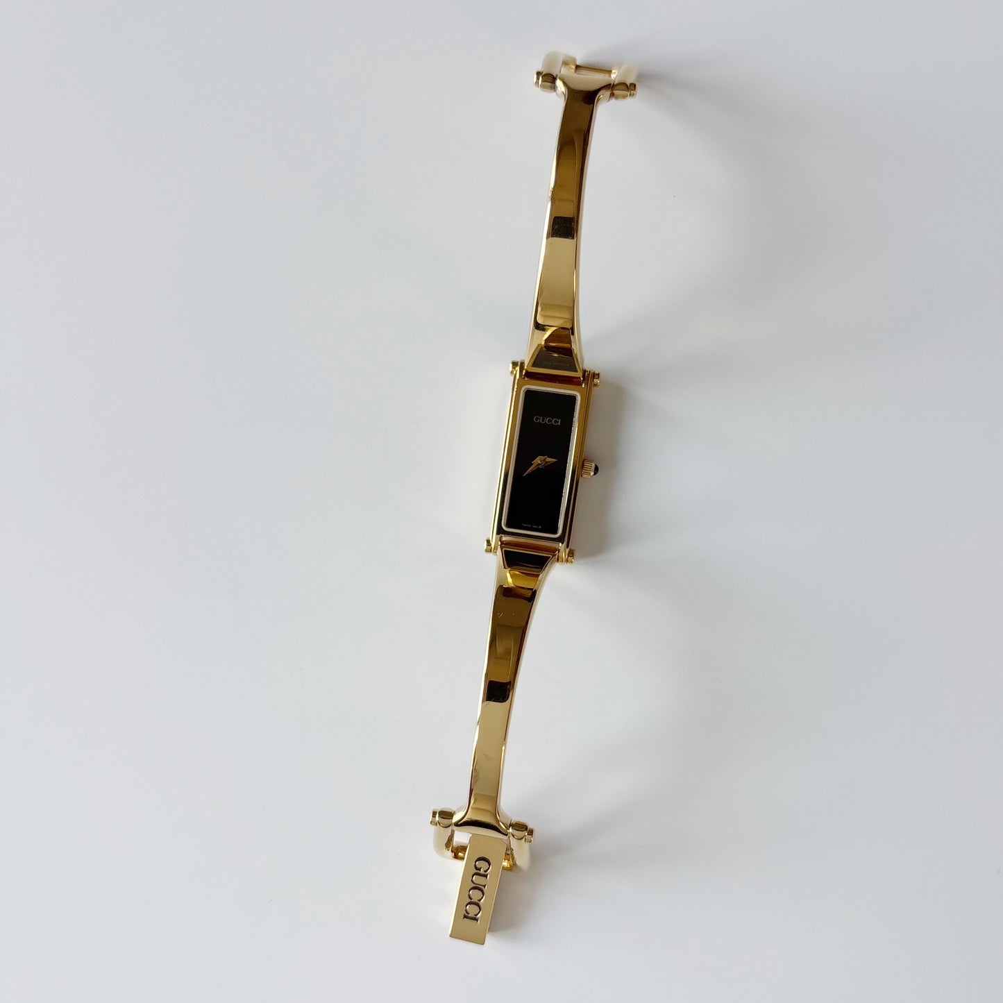 Gucci 1990s Black Dial Gold Plated Bangle Watch