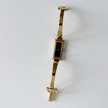 Gucci 1990s Black Dial Gold Plated Bangle Watch