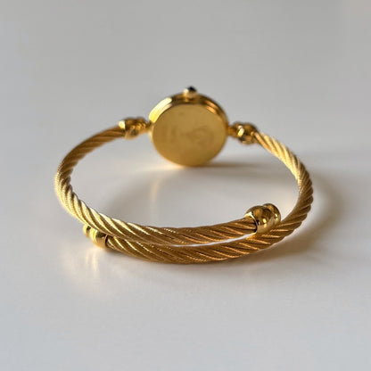 Gucci 1990s Seashell Round Dial Gold-Plated Cable Bangle Watch