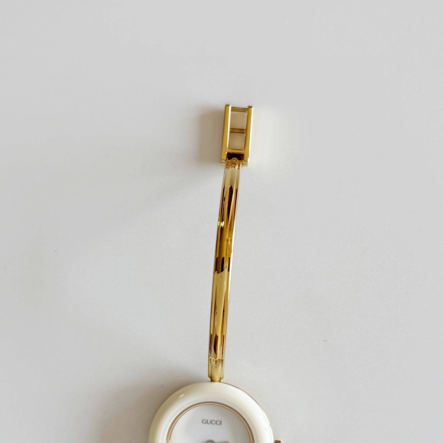 Gucci 1990s Interchangeable Bezel Gold Plated Bangle Watch with 12 bezels, case