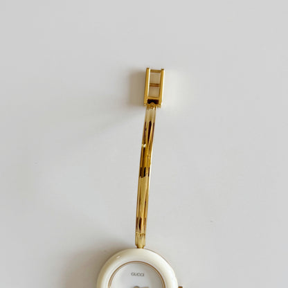 Gucci 1990s Interchangeable Bezel Gold Plated Bangle Watch with 12 bezels, case