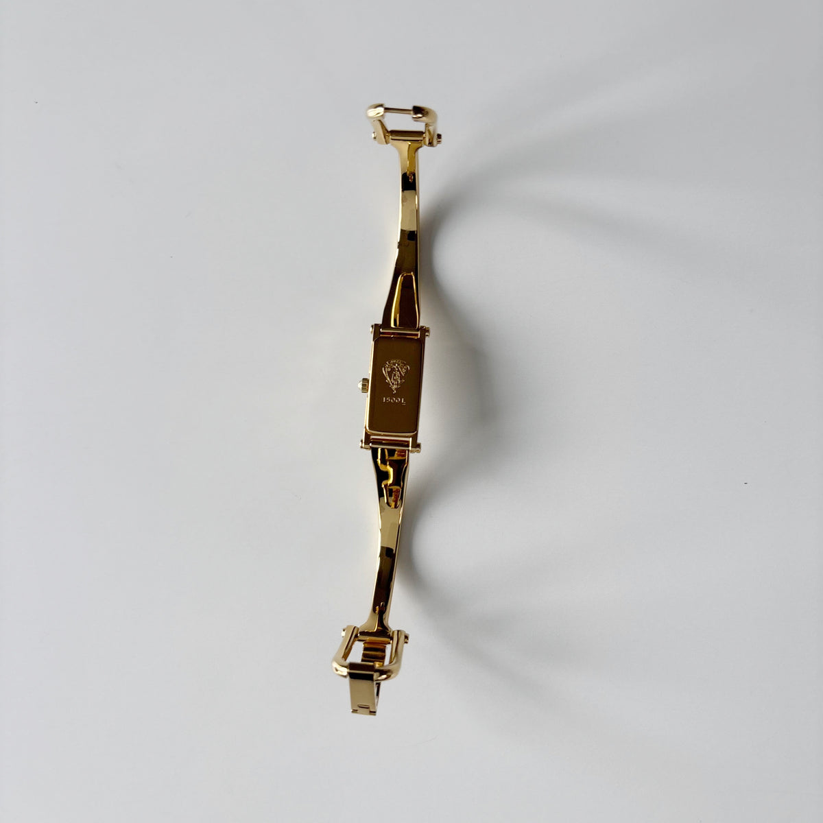Gucci 1990s Gold Rectangular Dial Gold Plated Bangle Watch