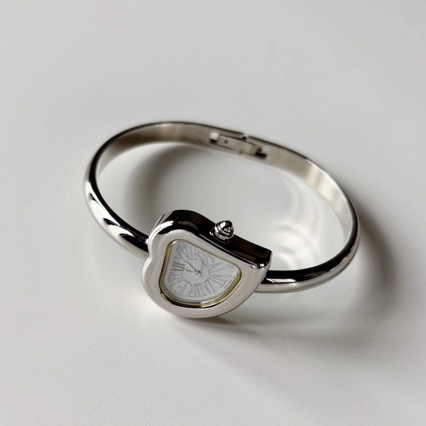 Yves Saint Laurent 1990s Heart Shaped Dial Silver Bangle Watch