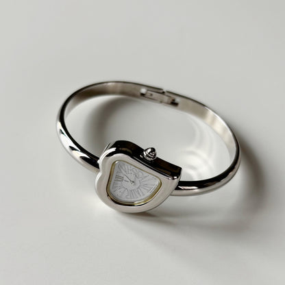Yves Saint Laurent 1990s Heart Shaped Dial Silver Bangle Watch