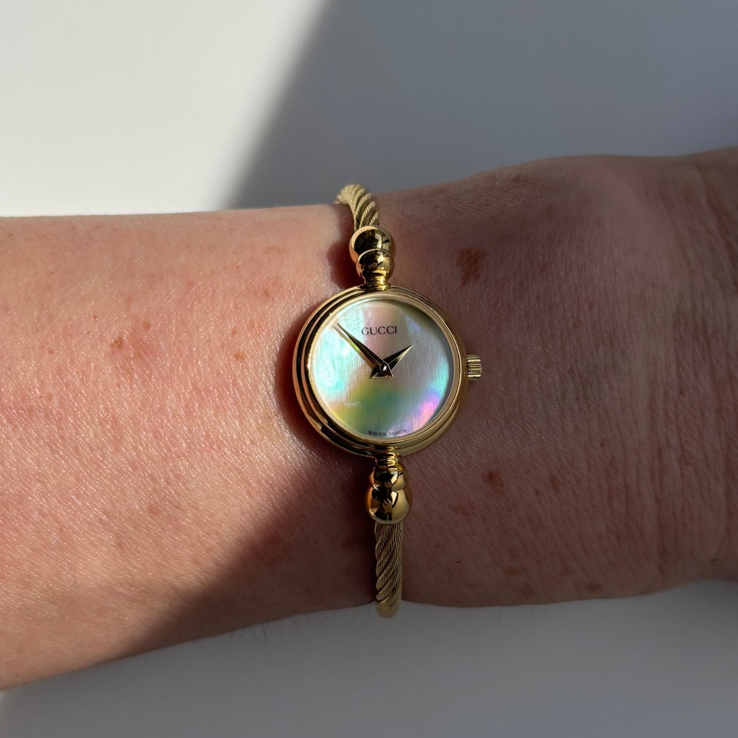 Gucci 1990s Seashell Dial Gold Plated Cable Bangle Watch