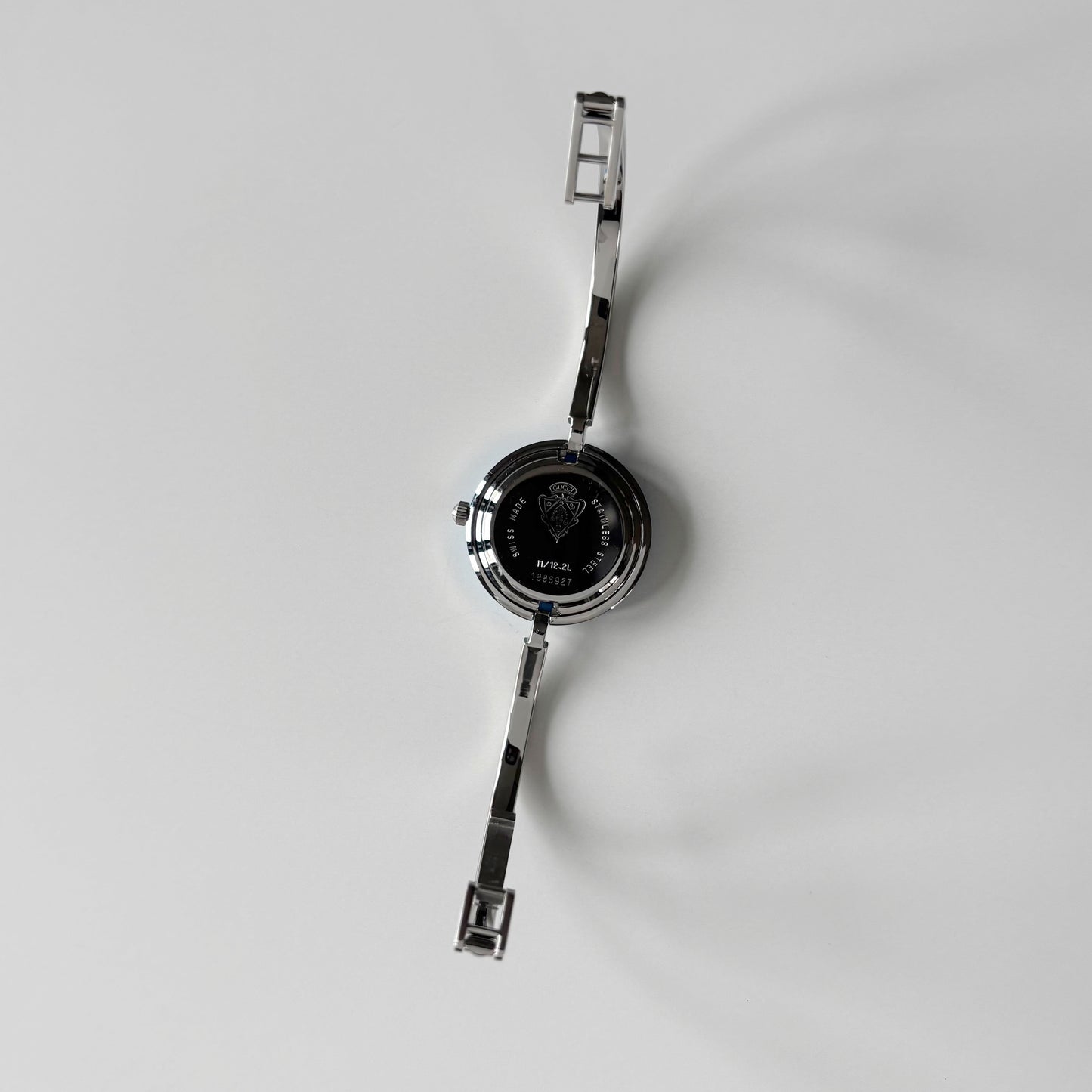 Gucci 1990s Interchangeable Bezel Silver Stainless steel Bangle Watch with 12 bezels, case
