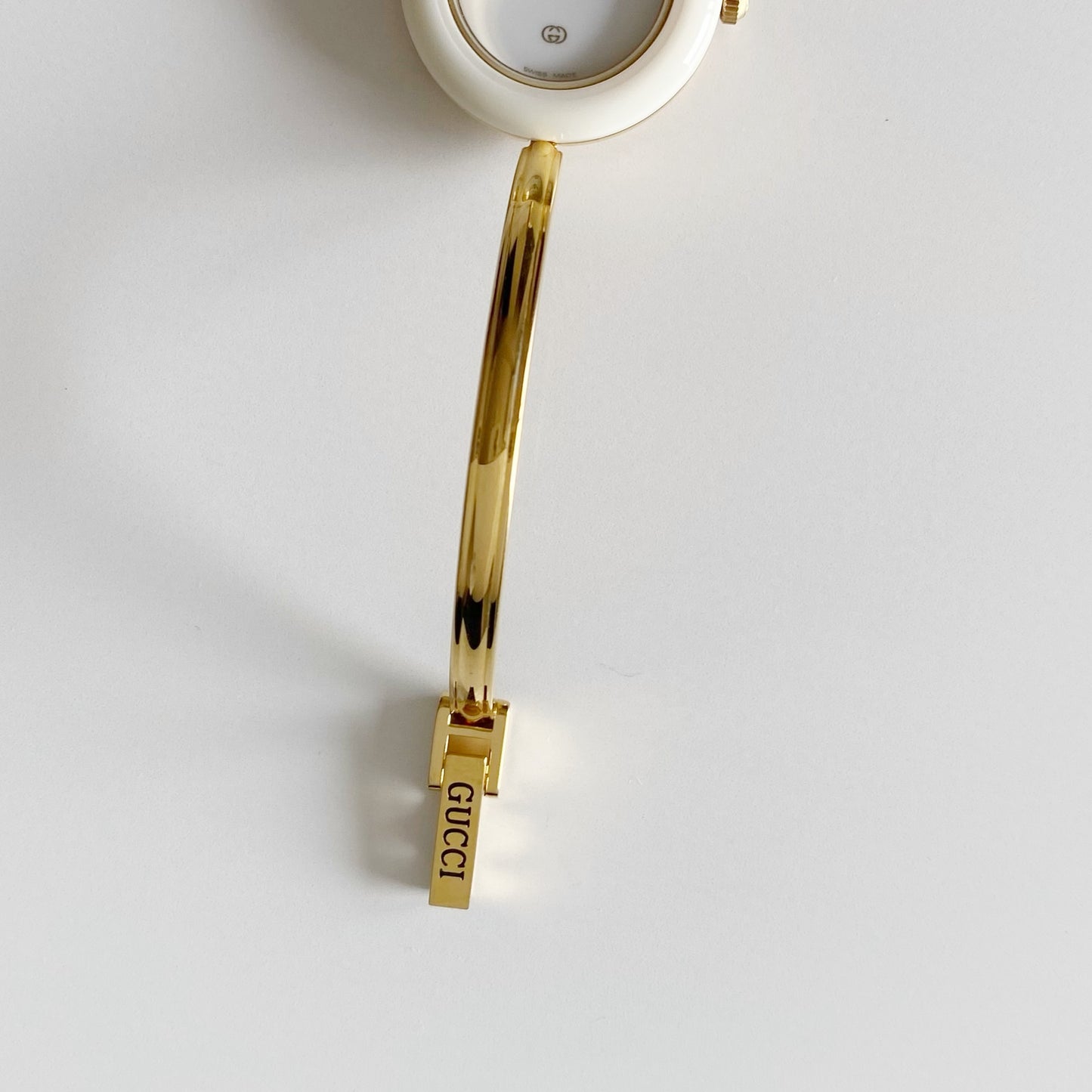 Gucci 1990s Interchangeable Bezel Gold Plated Bangle Watch with 12 bezels, case