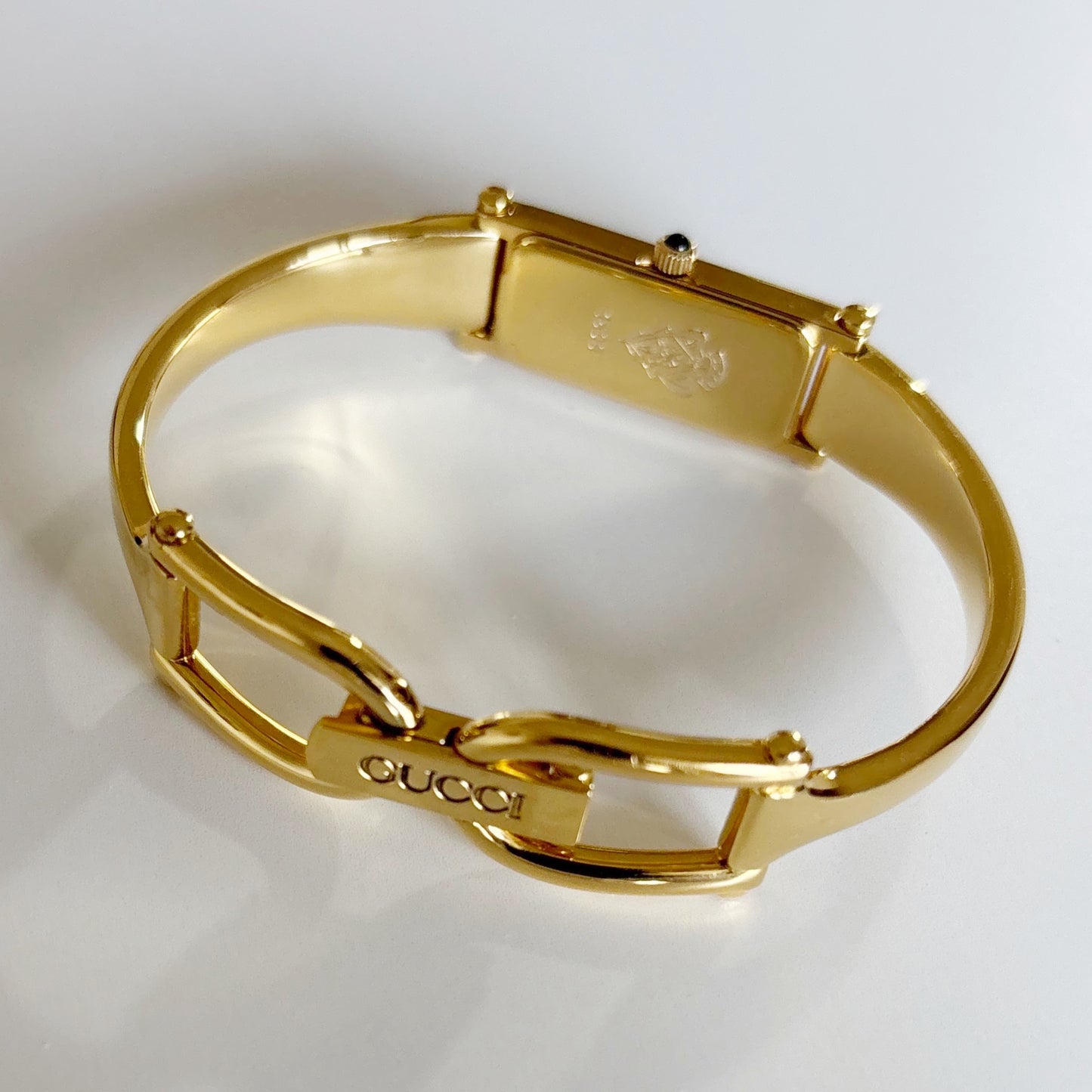 Gucci 1990s Black Dial Rectangular Gold Plated Bangle Watch
