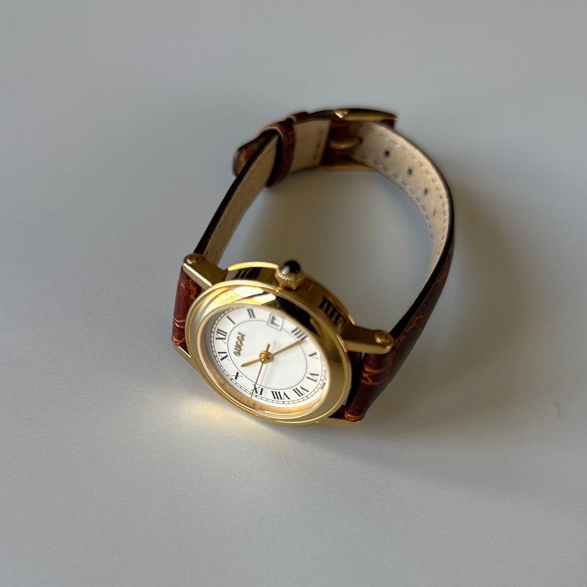 Gucci 1990s Date Round Dial Gold-Plated Watch