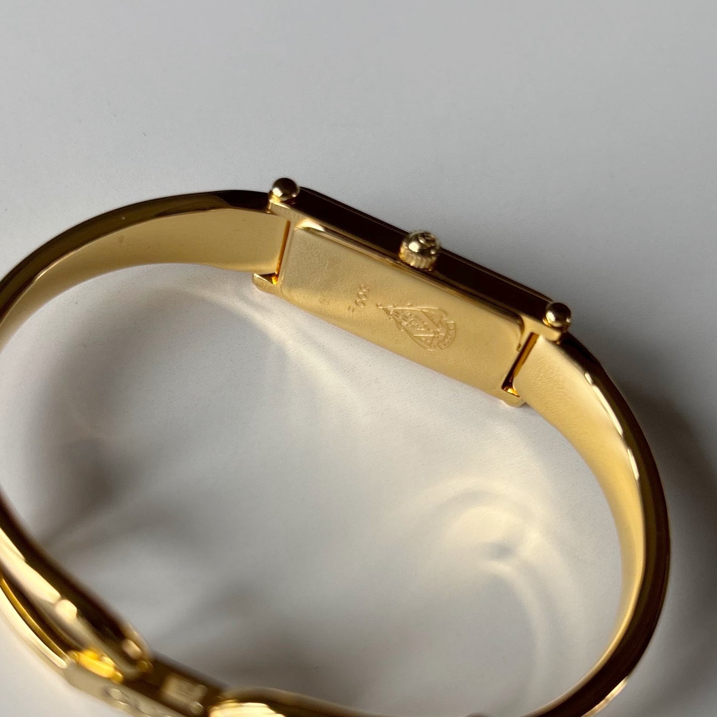 Gucci 1990s Seashell Rectangular Dial Gold Plated Bangle Watch