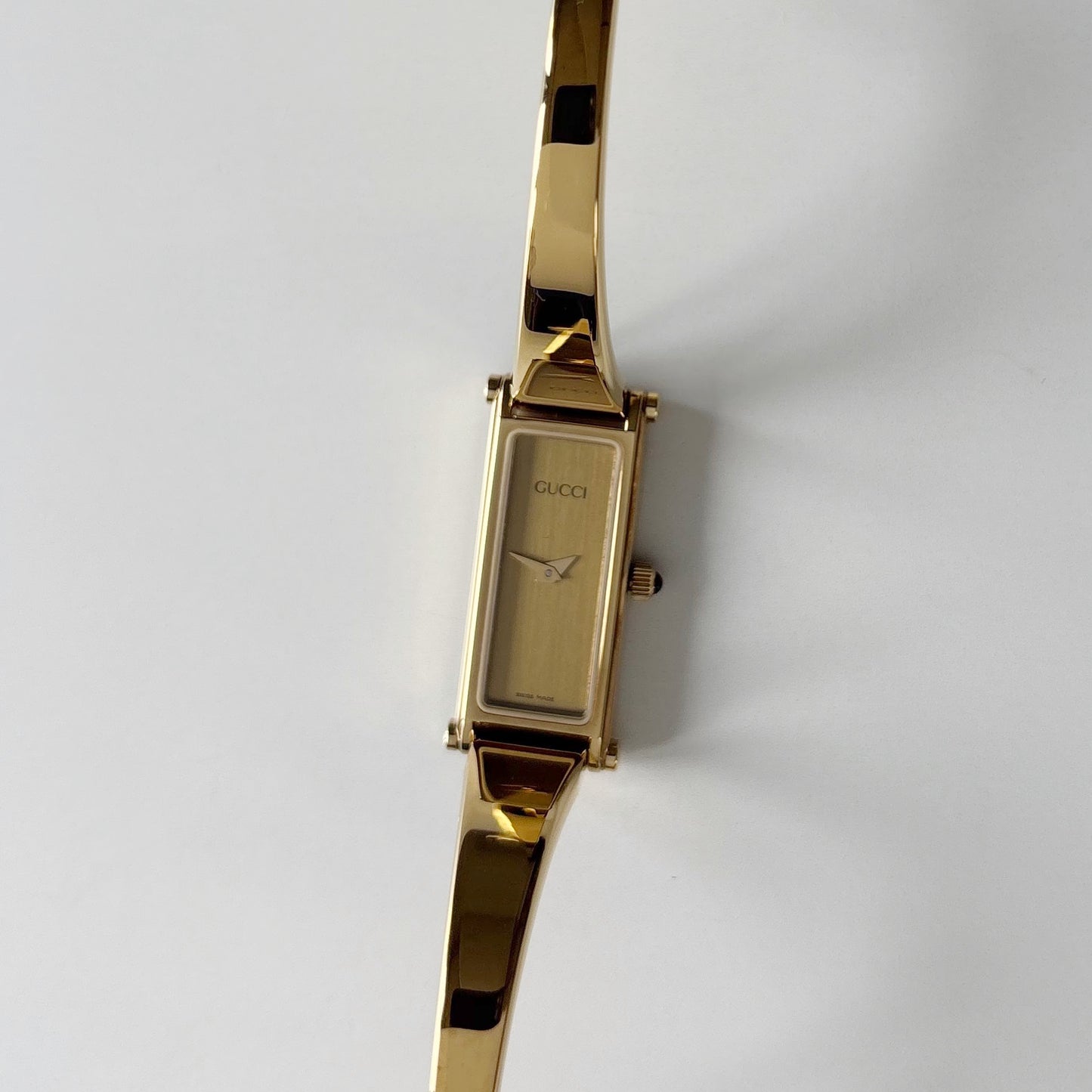 Gucci 1990s Gold Rectangular Dial Gold Plated Bangle Watch