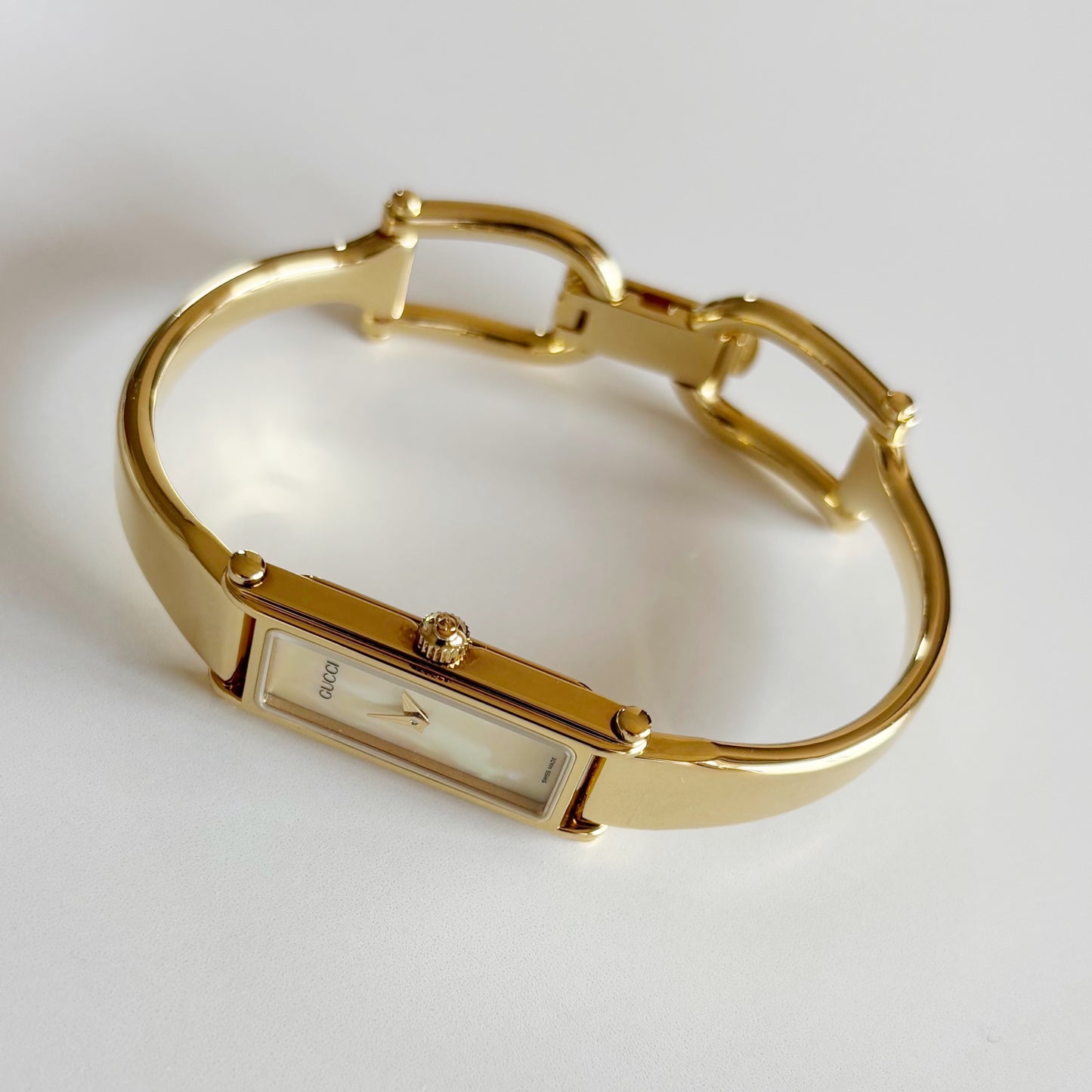 Gucci 1990s Seashell Rectangular Dial Gold Plated Bangle Watch