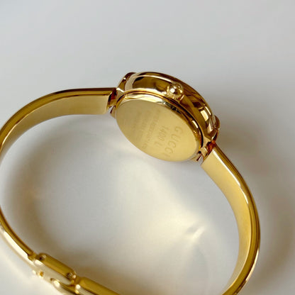 Gucci 1990s Round Dial Gold Plated Bangle Watch