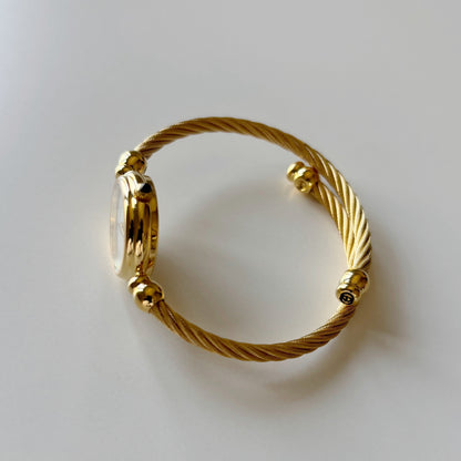 Gucci 1990s Seashell Dial Gold Plated Cable Bangle Watch