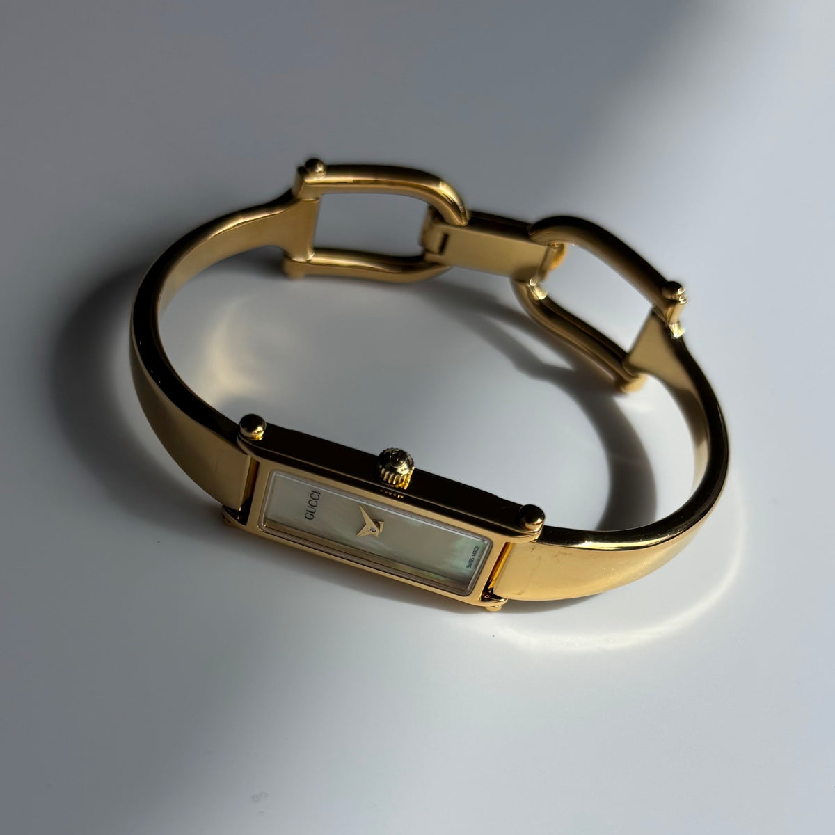 Gucci 1990s Seashell Rectangular Dial Gold Plated Bangle Watch