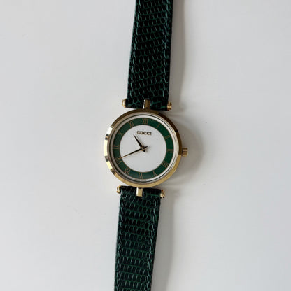 Gucci 1990s Round Dial Sherry Gold-Plated Watch (Large)