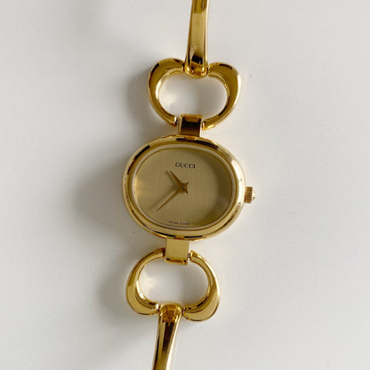 Gucci 1990s Gold Dial Gold Plated Bangle Watch