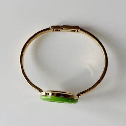 Gucci 1990s Interchangeable Bezel Gold Plated Bangle Watch with 12 bezels, case
