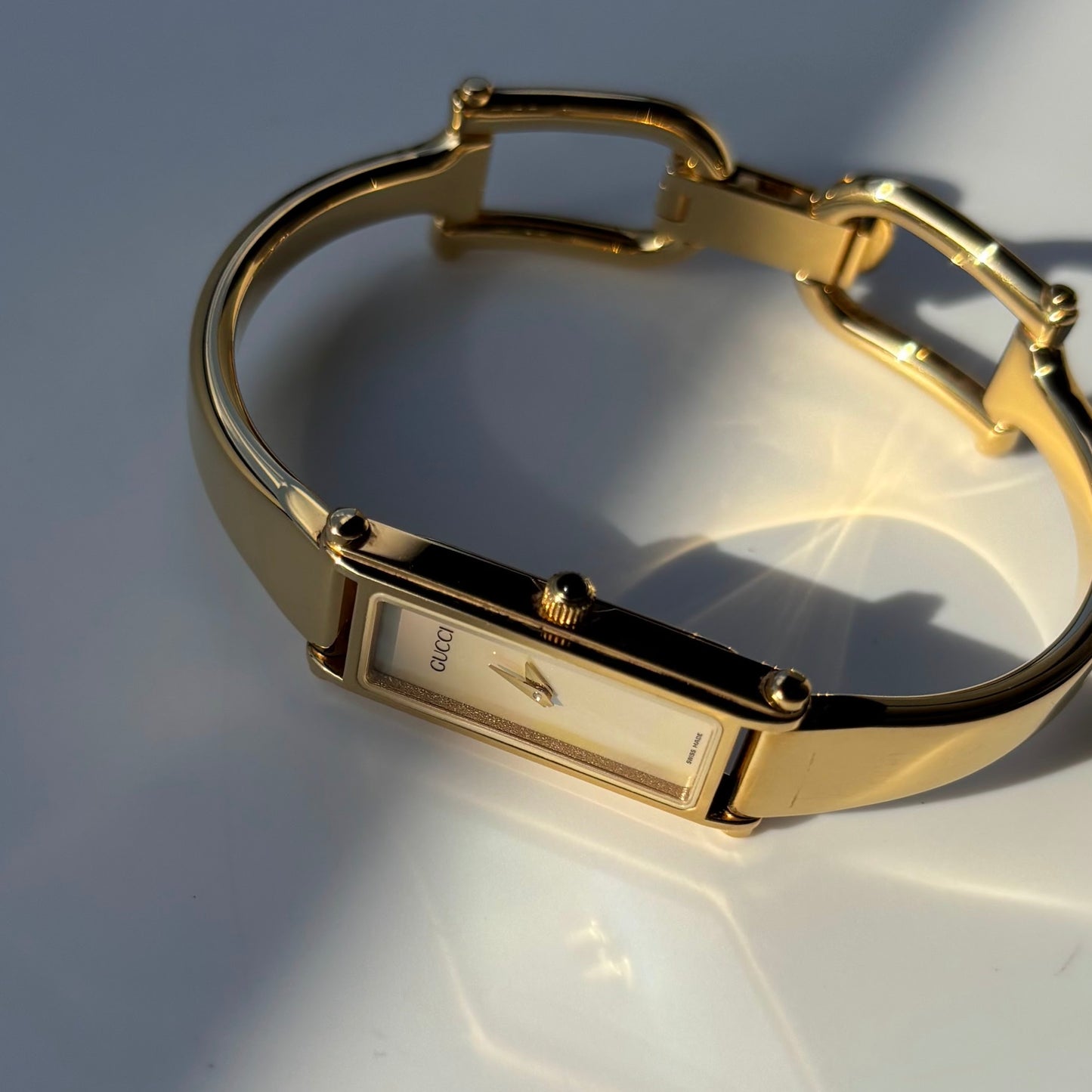 Gucci 1990s Seashell Dial Rectangular Gold Plated Bangle Watch