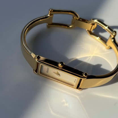 Gucci 1990s Seashell Dial Rectangular Gold Plated Bangle Watch