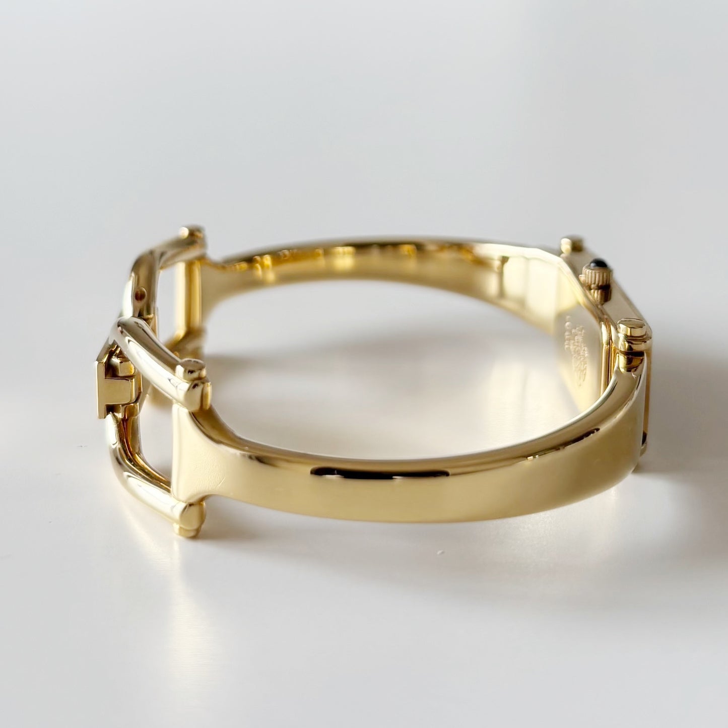 Gucci 1990s Rectangular Black Dial Gold Plated Bangle Watch