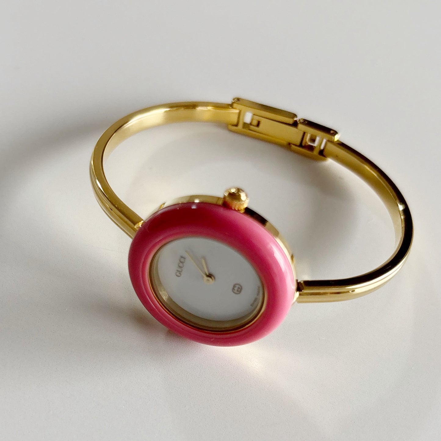 Gucci 1990s Interchangeable Bezel Gold Plated Bangle Watch with 12 bezels, case (Small)