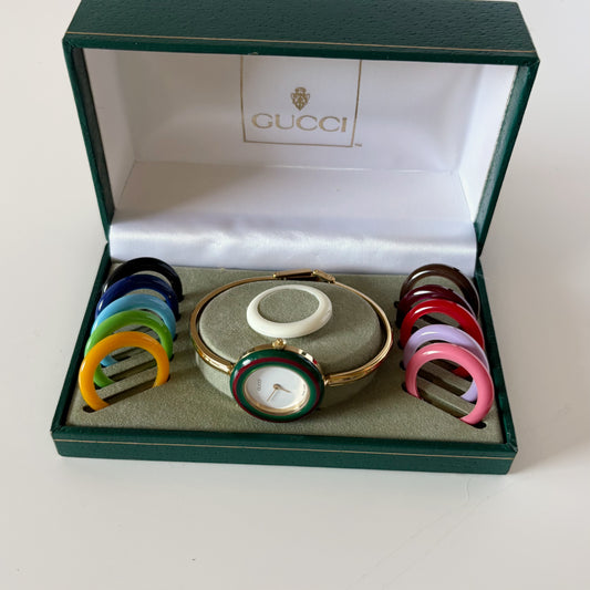 Gucci 1990s Interchangeable Bezel Gold Plated Bangle Watch with 12 bezels, case (8/30)