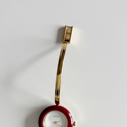 Gucci 1990s Interchangeable Bezel Gold Plated Bangle Watch with 12 bezels, case