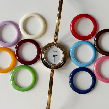 Gucci 1990s Interchangeable Bezel Gold Plated Bangle Watch with 12 bezels, case