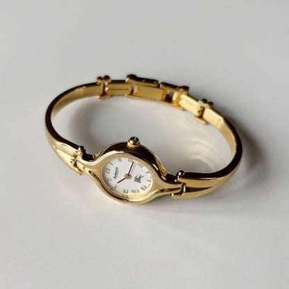 Burberry 1990s Round Dial Gold Plated Bangle Watch