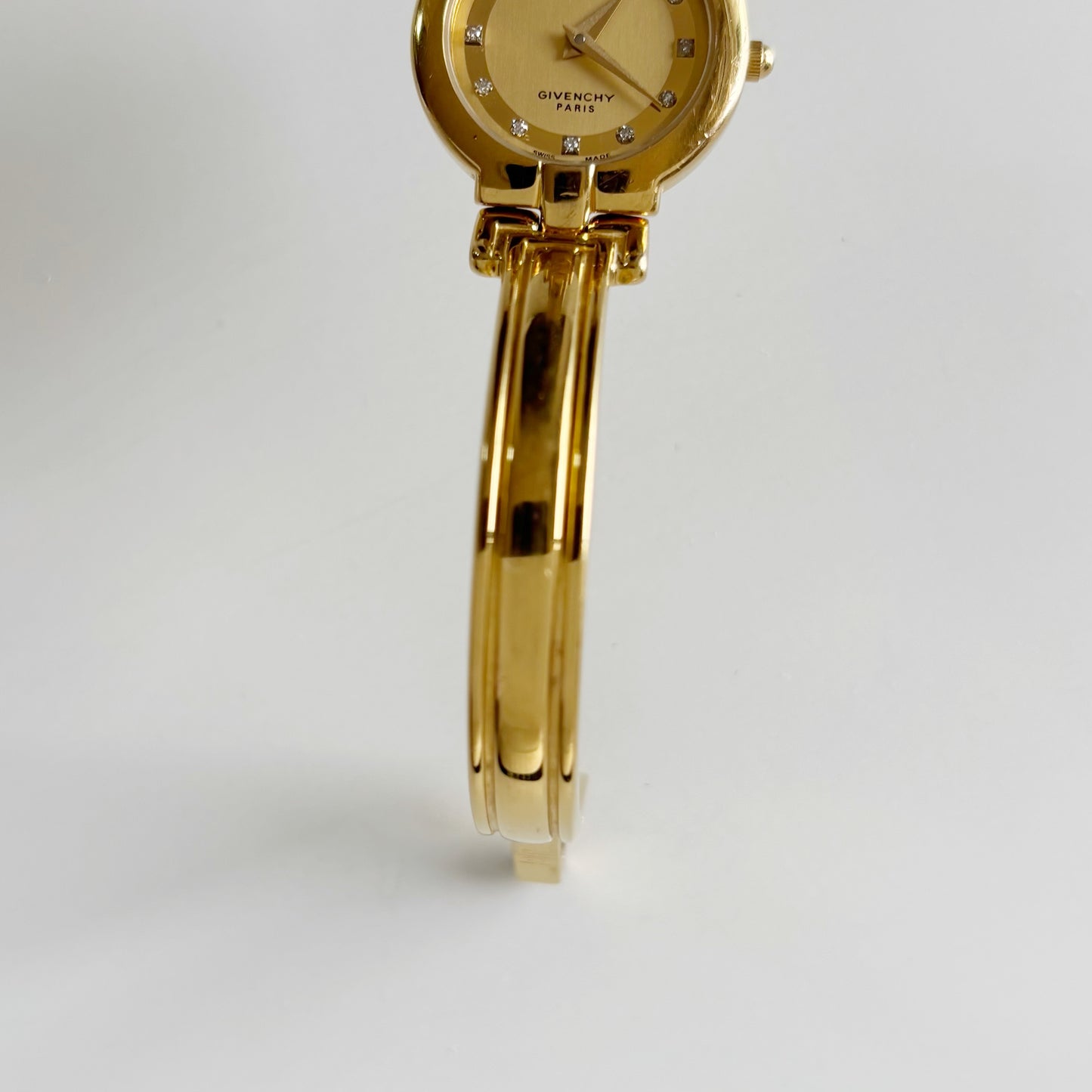 Givenchy 1990s Round Dial Gold Plated Bangle Watch