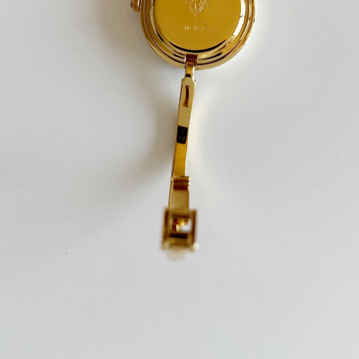 Gucci 1990s Interchangeable Bezel Gold Plated Bangle Watch with 12 bezels, case
