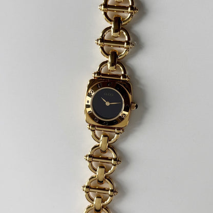 Gucci 1990s Black Dial Gold Plated Horsebit Watch