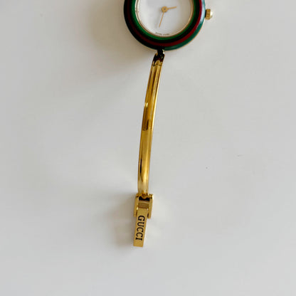 Gucci 1990s Interchangeable Bezel Gold Plated Bangle Watch with 12 bezels, case