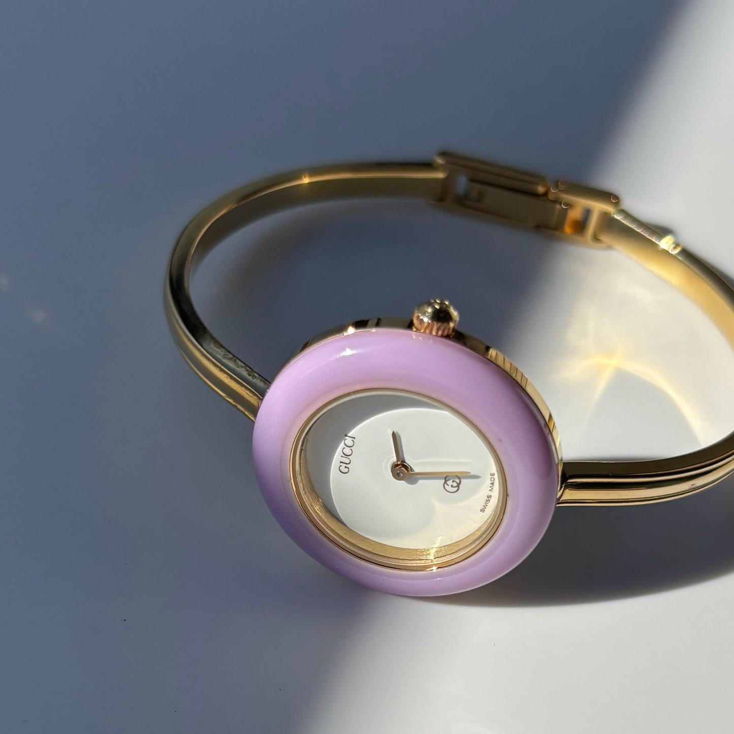 Gucci 1990s Interchangeable Bezel Gold Plated Bangle Watch with 12 bezels, case