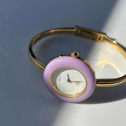 Gucci 1990s Interchangeable Bezel Gold Plated Bangle Watch with 12 bezels, case