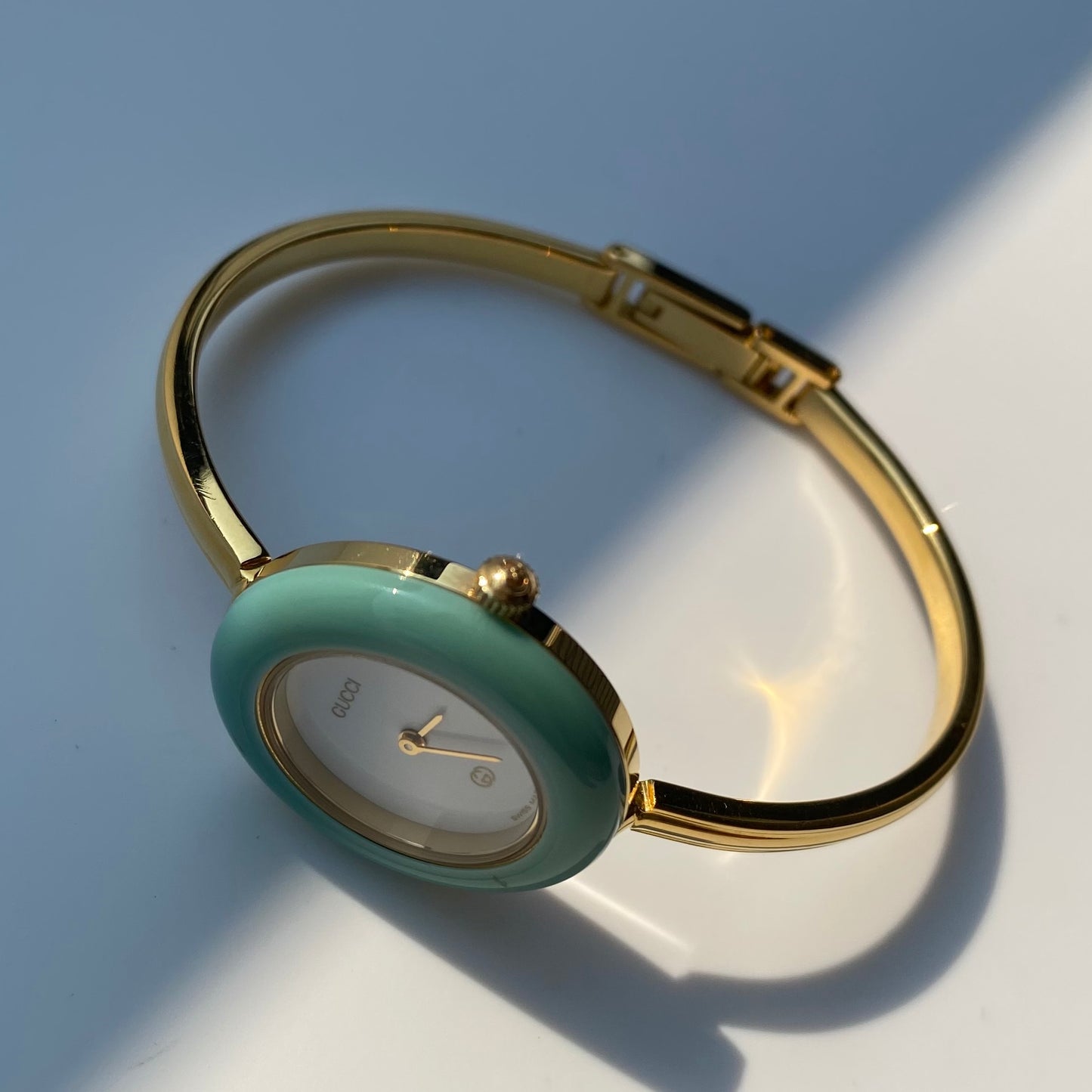 Gucci 1990s Interchangeable Bezel Gold Plated Bangle Watch with 12 bezels, case
