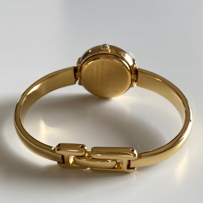 Gucci 1990s Round Dial Gold Plated Bangle Watch
