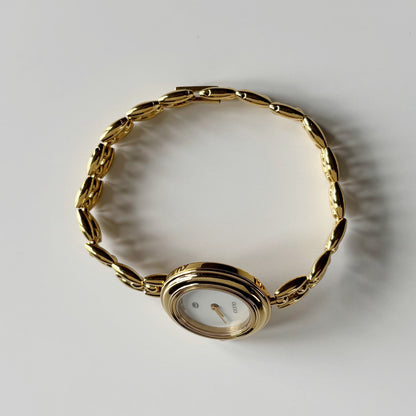 Gucci 1990s Interchangeable Bezel Gold Plated Rice Chain Watch with 6 bezels, case (172mm)
