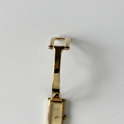 Gucci 1990s Gold Rectangular Dial Gold Plated Bangle Watch