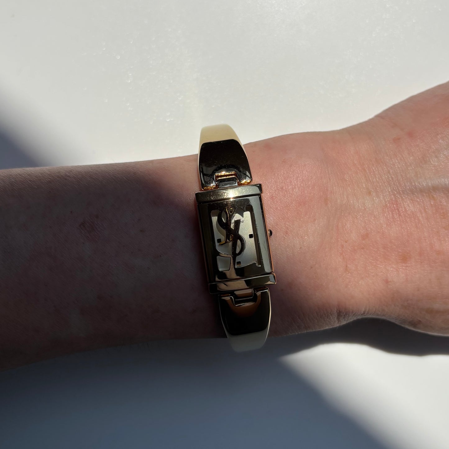 Yves Saint Laurent 1990s Peek a boo Gold Plated Bangle Watch