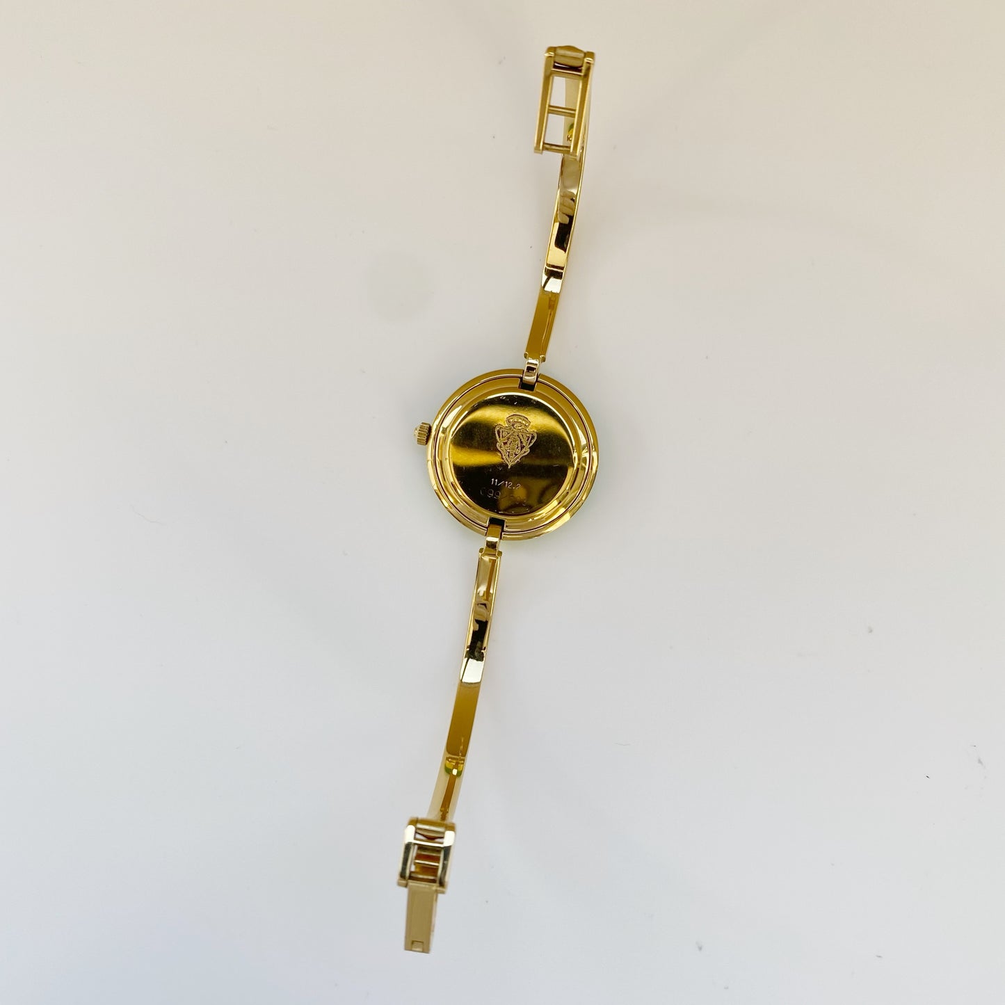 Gucci 1990s Interchangeable Bezel Gold Plated Bangle Watch with 12 bezels, Case